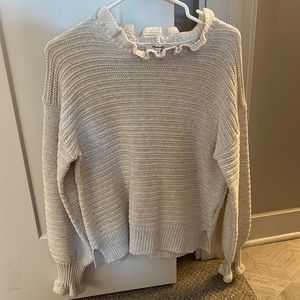 Madewell cream sweater with frill detail at neck and sleeves